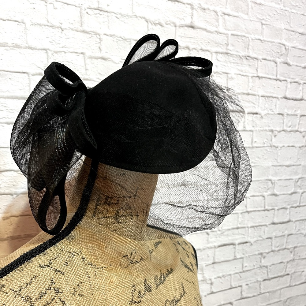 Ladies Adolfo II Vintage Black hat with large bow in the back with black netting